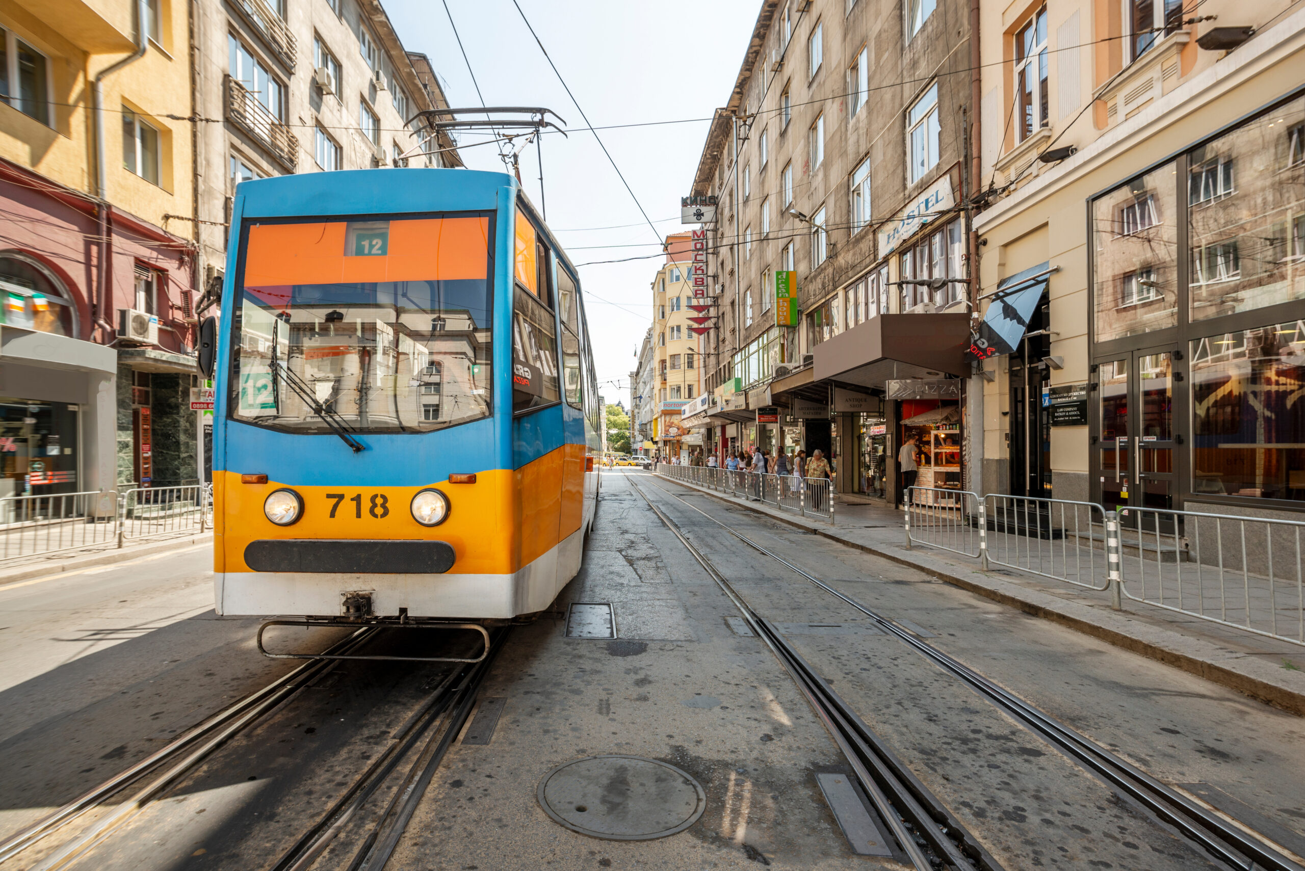 blue and yellow tram on the track in sofia bulgaria