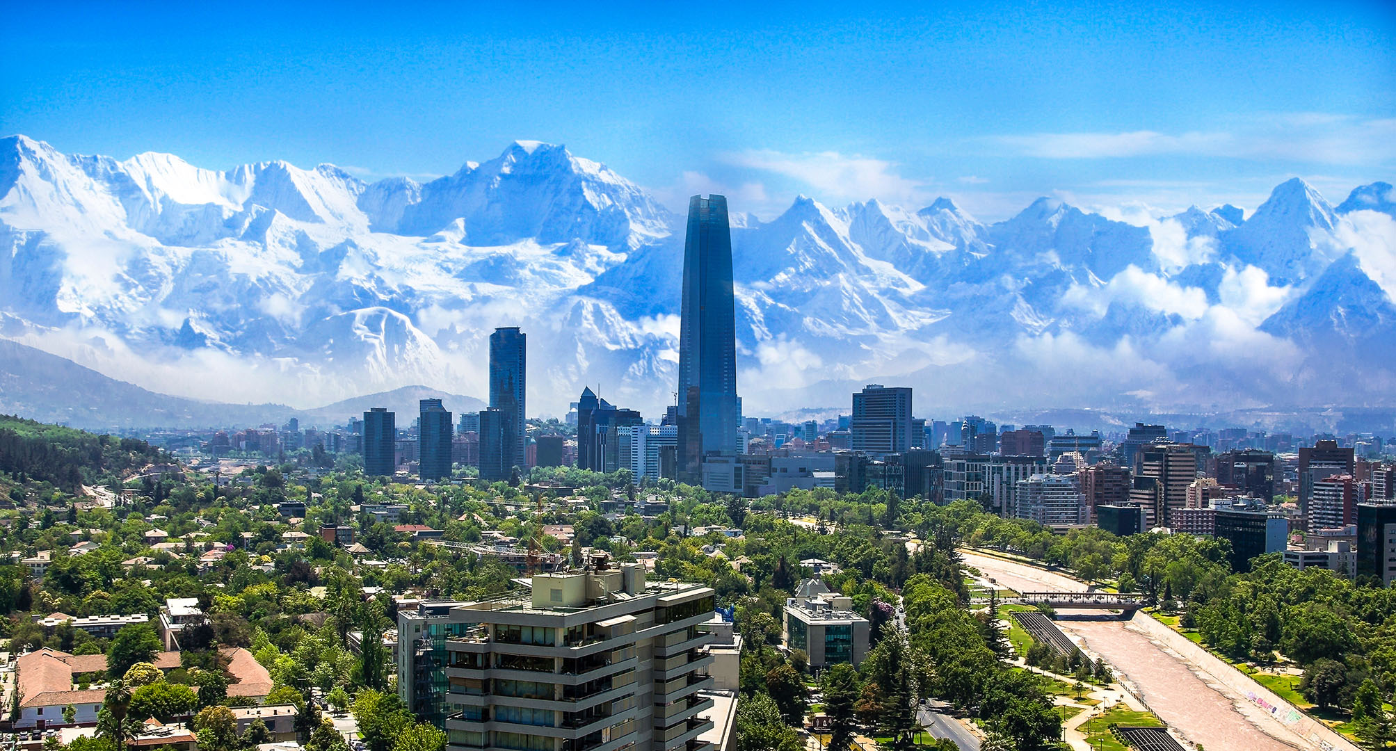 santiago chile cityscape with snow covered mountains