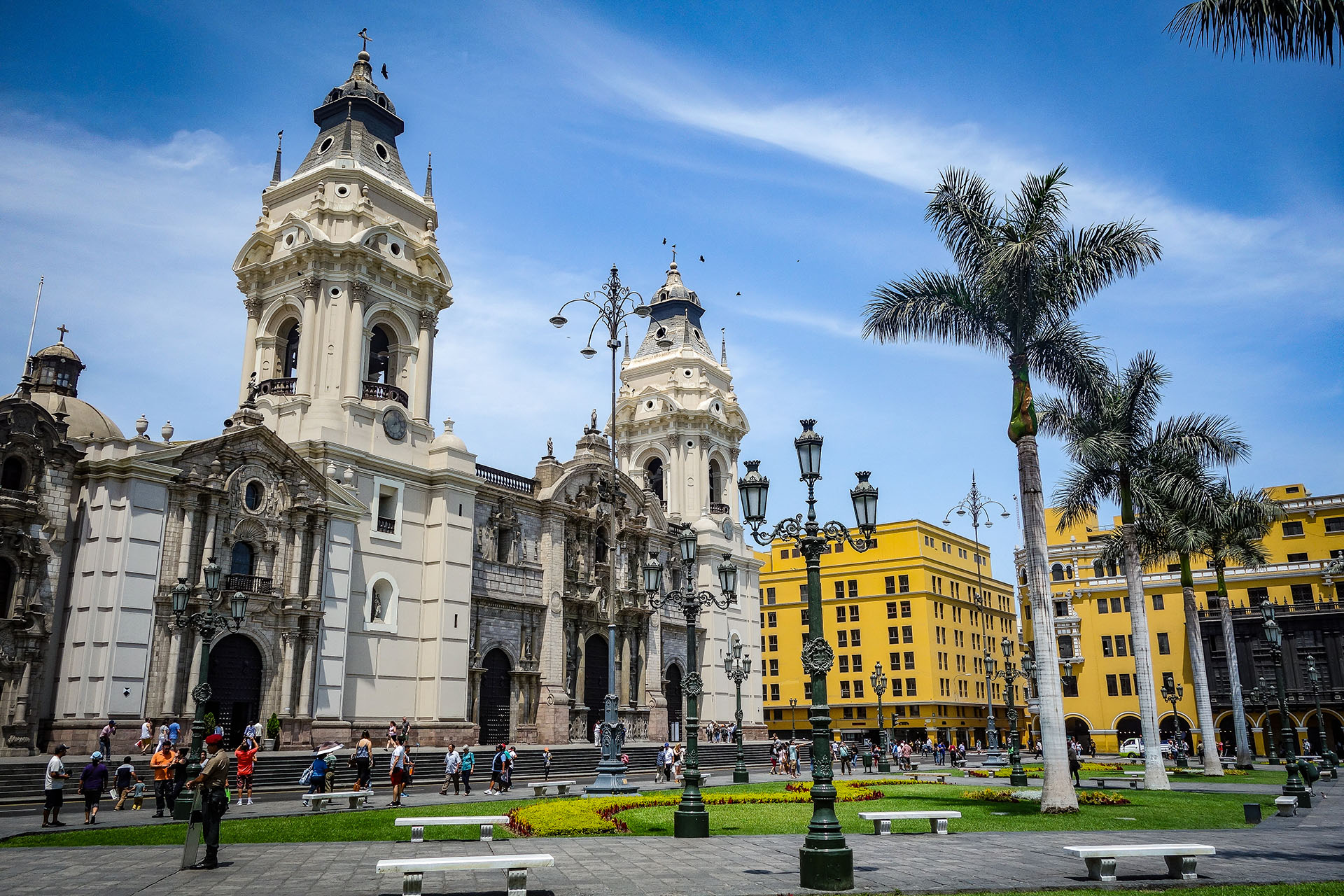 April,7,,2018,-,Lima,,Peru:,Cathedral,And,Plaza,De beautiful cathedral and yellow building main plaza Lima, Peru