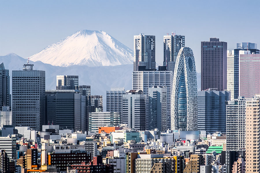 Tokyo Shinjuku building and Mt. Fuji at Behind mount fuji